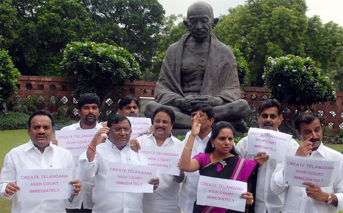 TRS MPs protest for HC bifurcation